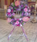 Round personalized wreath on a flower stand - funeral flowers in Cape Town